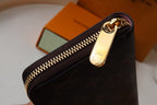 ZIPPY WALLET 9.5 MONOGRAM CANVAS