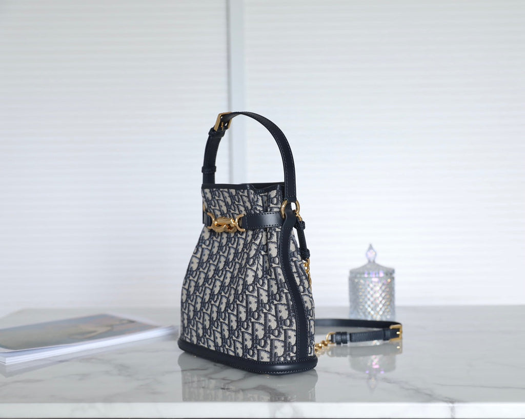 MONTAIGNE MEDIUM 24 BUCKET BAG IN BLUE OBLIQUE JACQUARD CALFSKIN