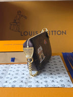 LV Chrismas Collection Mini Pochette Accessoires clutch bag Brown Monogram Canvas 274915