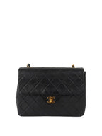 CHNL -  Black  Flap Bag GHW.