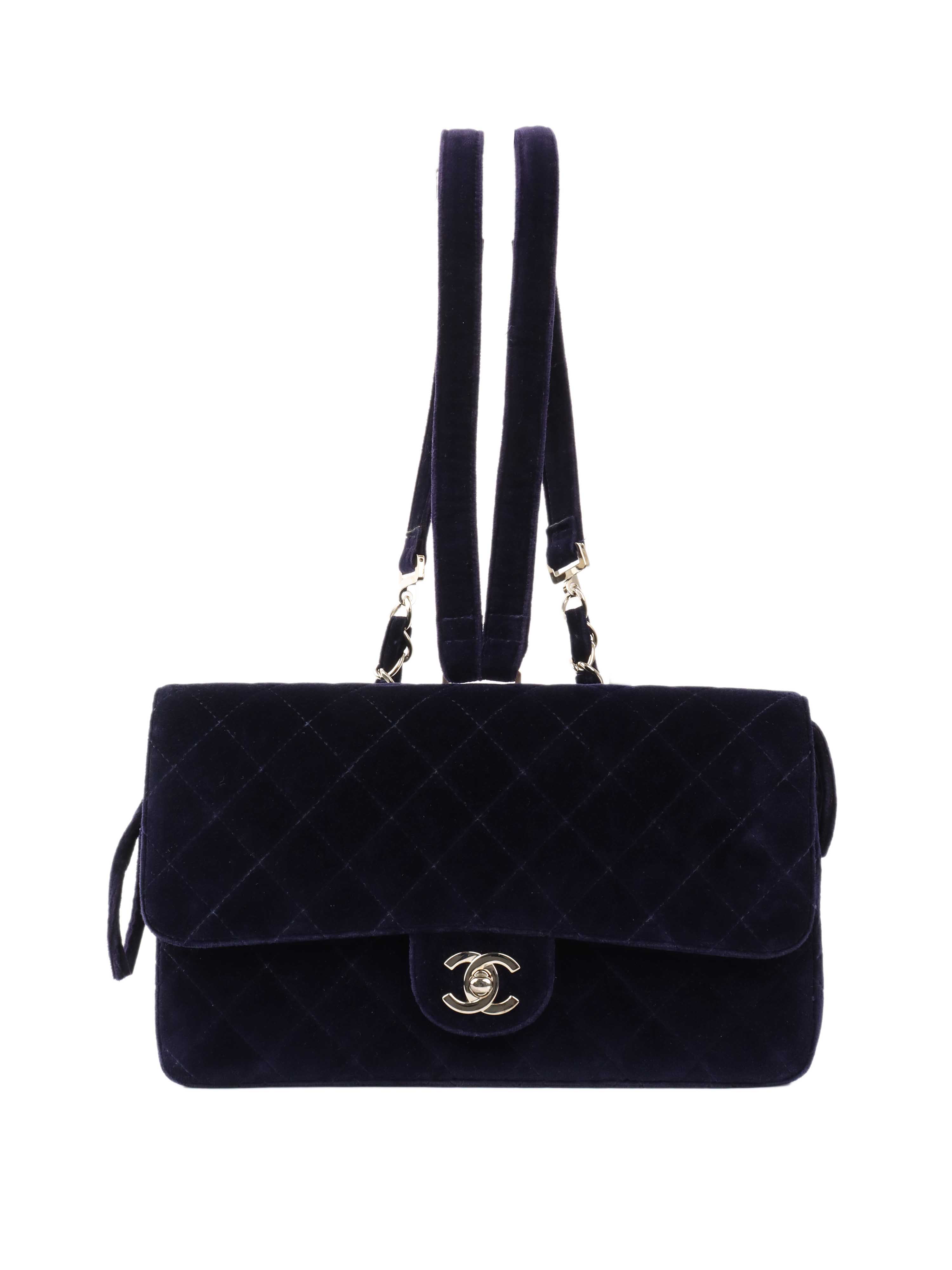 CHNL -   Navy Velvet Classic Flap Backpack.