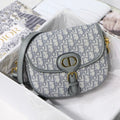 MEDIUM CD BOBBY 22CM GREY OBLIQUE CANVAS GOLD HARDWARE