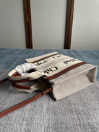 SMALL STRAP WOODY TOTE BAG 26.5 IN BEIGE LINEN CANVAS BLACK WEBBING LOGO EMBROIDER BROWN CALFSKIN