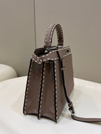 PEEKABOO ISEEU 33 IN TOBACCO BROWN GRAINED CALFSKIN SILVER HARDWARE