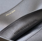 PEEKABOO ISEEU 27 IN BLACK SMOOTH CALFSKIN WITH WOVEN TRIM GOLD HARDWARE
