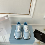 PRADA 25S THICK SOLE SNEAKER IN LIGHT BLUE CALFSKIN AND CANVAS
