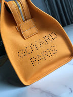 HARDY PM BAG 40 IN YELLOW GOYARDINE CANVAS AND TAURILLON LEATHER TRIM