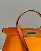 PEEKABOO ISEEU 33 IN ORANGE OMBRE SMOOTH CALFSKIN GOLD HARDWARE