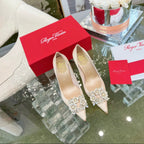 EFFLORESCENCE POINTED-TOE PUMPS IN NUDE SATIN WITH CRYSTAL BUCKLE