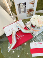 EFFLORESCENCE POINTED-TOE PUMPS 85MM IN SILVER SATIN WITH CRYSTAL BUCKLE