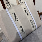 LAGRE WOODY TOTE BAG 45 IN BEIGE LINEN CANVAS BLACK WEBBING LOGO EMBROIDER WHITE CALFSKIN