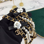 CHANEL 25S CHAIN BELT IN WHITE PEARL AND BLACK CALFSKIN 614403