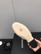 HALF-MULES IN CREAM WOOL WOVEN