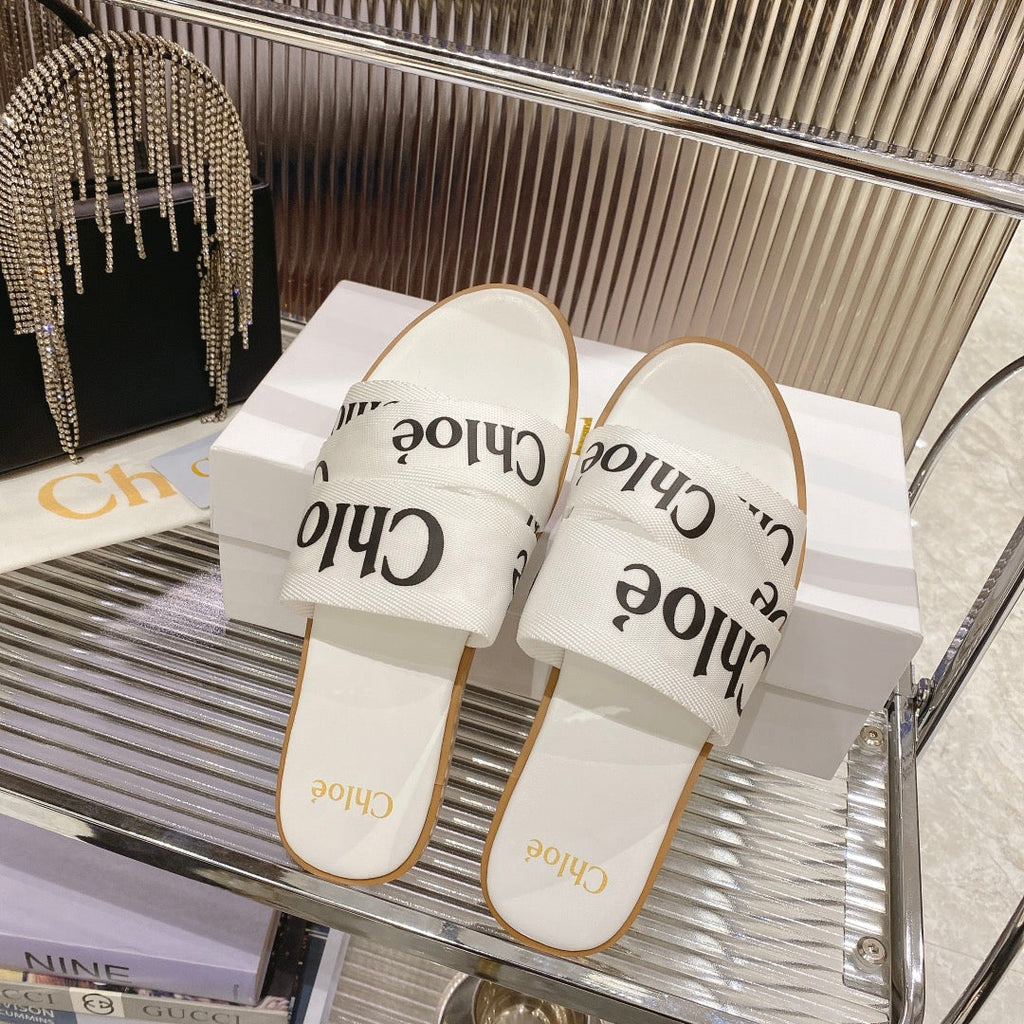 CHLOÉ WOODY SLIPPER IN WHITE MIX BLACK CANVAS