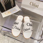 WOODY SLIPPER IN WHITE MIX BLACK CANVAS
