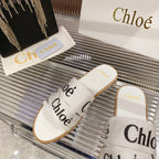 WOODY SLIPPER IN WHITE MIX BLACK CANVAS