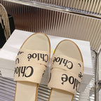 WOODY SLIPPER IN BEIGE MIX BLACK CANVAS