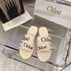 WOODY SLIPPER IN BEIGE MIX BLACK CANVAS