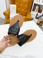THONG MULE IN BLACK CALFSKIN