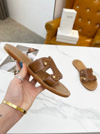 TRIOMPHE SLIDE IN BRONZE BROWN CALFSKIN