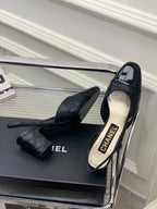 HIGH SLINGBACKS 65 BLACK CALFSKIN