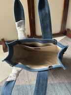MEDIUM WOODY TOTE BAG 37 IN BLUE DENIM BLACK CALFSKIN