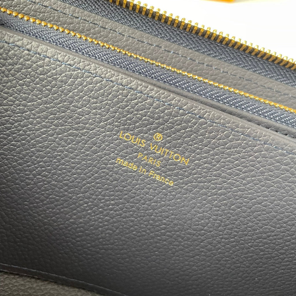 LV M61864 Zippy Wallet Blue Monogram Empreinte Leather 221616