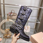THICK-SOLED BUCKLE BOOTS IN BLACK CALFSKIN
