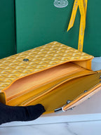 MONTE-CARLO PM CLUTCH 25 IN YELLOW GOYARDINE CANVAS
