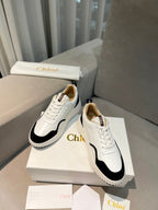 NAMA SNEAKER IN WHITE LAMBSKIN AND BLACK SUEDE
