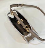 PEEKABOO ISEEU 27 IN MEDIUM BROWN INTERLACED CALFSKIN GOLD HARDWARE
