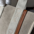 MEDIUM WOODY TOTE BAG 37 IN BEIGE LINEN CANVAS WEBBING LOGO EMBROIDERY BROWN CALFSKIN