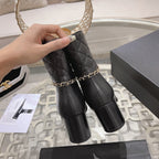 MID-HEEL ANKLE BOOTS IN BLACK CALFSKIN