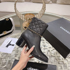 MID-HEEL ANKLE BOOTS IN BLACK CALFSKIN