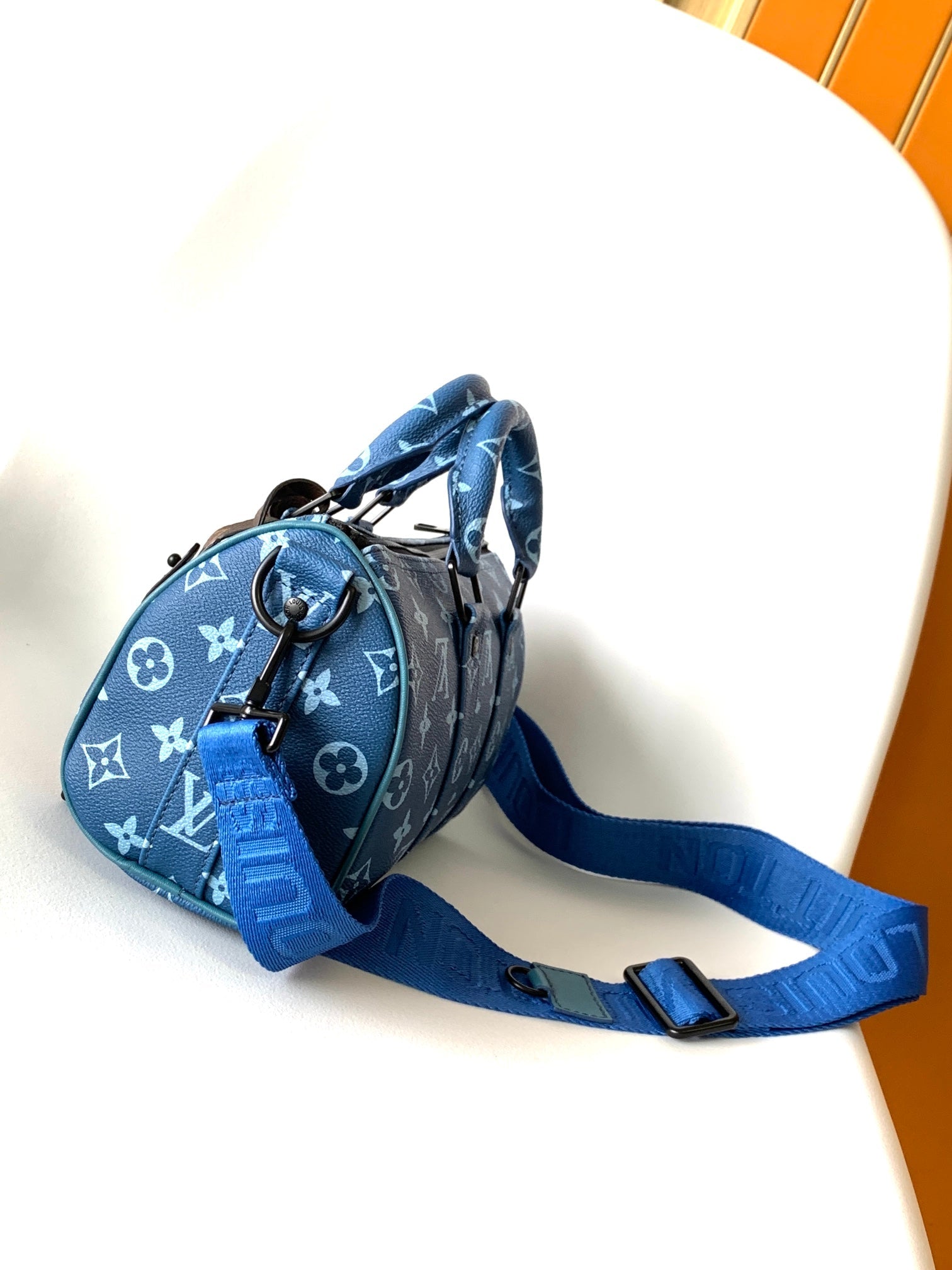 LV 21s Keepall Bandoulière 25 Blue Monogram Canvas & Cowhide