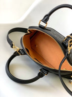 LV Néo Alma BB 44829 Black Monogram Shadow embossed calfskin
