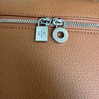 EXTRA POCKET BACKPACK L23.5 IN GINGER ORANGE CALFSKIN WITH SILVER HARDWARE