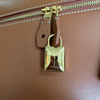 EXTRA BAG L27 IN GINGER ORANGE SMOOTH CALFSKIN WITH GOLD HARDWARE