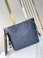 NEVERFULL MM 31 IN DARK NAVY MONOGRAM EMPREINTE LEATHER