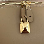 EXTRA BAG L27 IN PEANUT BROWN SMOOTH CALFSKIN WITH GOLD HARDWARE