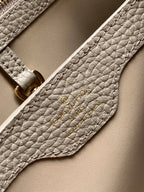 CAPUCINES BB 27 IN KHAKI BROWN TAURILLON GOLD HARDWARE