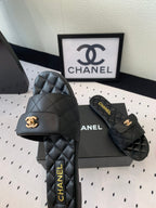 CC SLIPPERS IN BLACK CALFSKIN