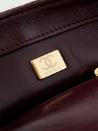 FLAP BAG WITH TOP HANDLE 18 IN WINE RED OIL-WAX LAMBSKIN GOLD HARDWARE