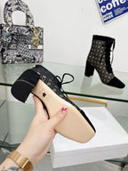 NAUGHTILY-D HEELED ANKLE BOOT IN BLACK CANNAGE MOTIF MESH AND SUEDE 8 CM