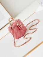 CHANEL 25S MINI VANITY BAG 11 CM IN PEACH PINK LAMBSKIN WITH CRYSTAL-EMBELLISHED CC LOGO