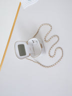 CHANEL 25S MINI VANITY BAG 11 CM IN WHITE LAMBSKIN WITH CRYSTAL-EMBELLISHED CC LOGO