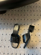 CLEMENCE MULE IN BLACK LAMBSKIN AND PATENT CALFSKIN