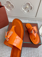 FLIP FLOPS IN ORANGE LAMBSKIN SNAKE EMBOSSING