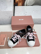 WASHED-DENIM SNEAKERS IN BLACK CANVAS WITH BROWN AND STRIPED LACES