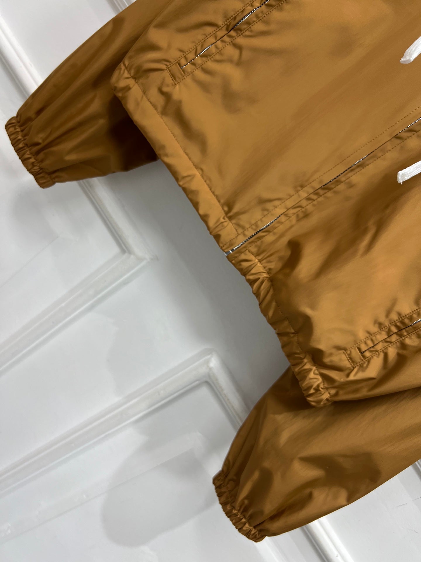MIU 25S HOODED JACKET BROWN IN NYLON 263023